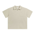 Cotton loose-fit drop-shoulder short sleeve top in Paris forest green, front view, with simple lapel neckline
