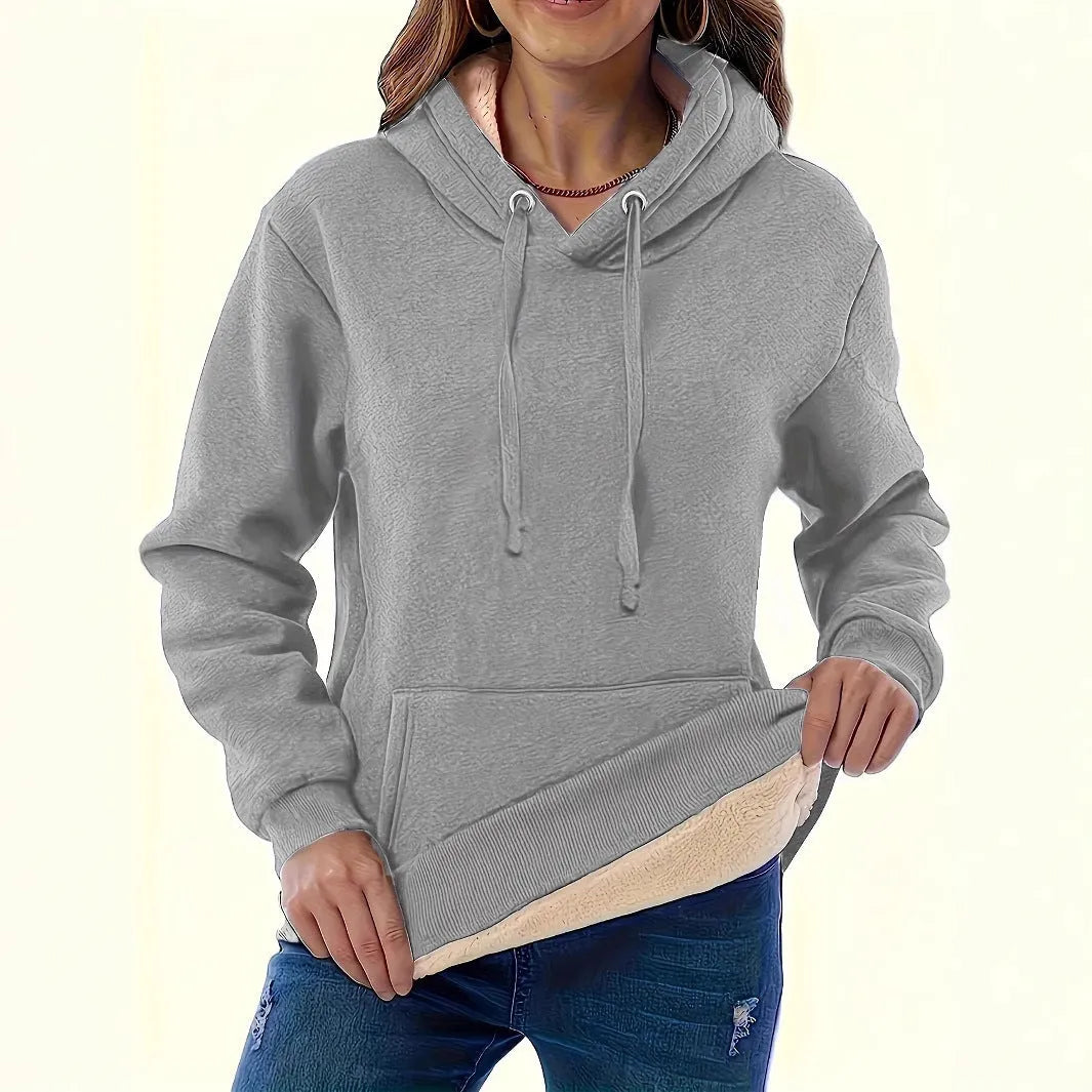 Women's loose fit hooded sweater with front pockets in thick polyester fleece