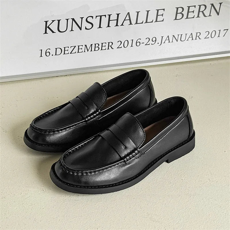 A pair of men's slip-on casual shoes in microfiber, shown in one of four colours: black, beige, apricot, or brown.
