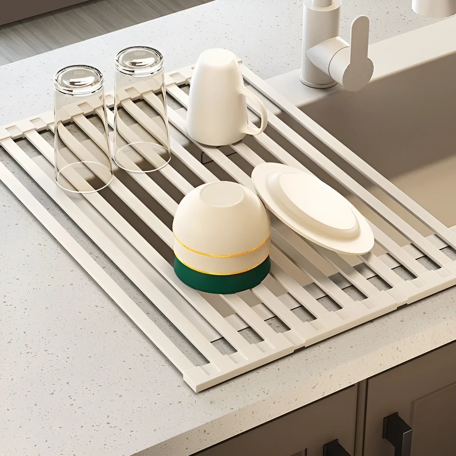 Milky White foldable stainless steel kitchen draining rack shown folded and unfolded.