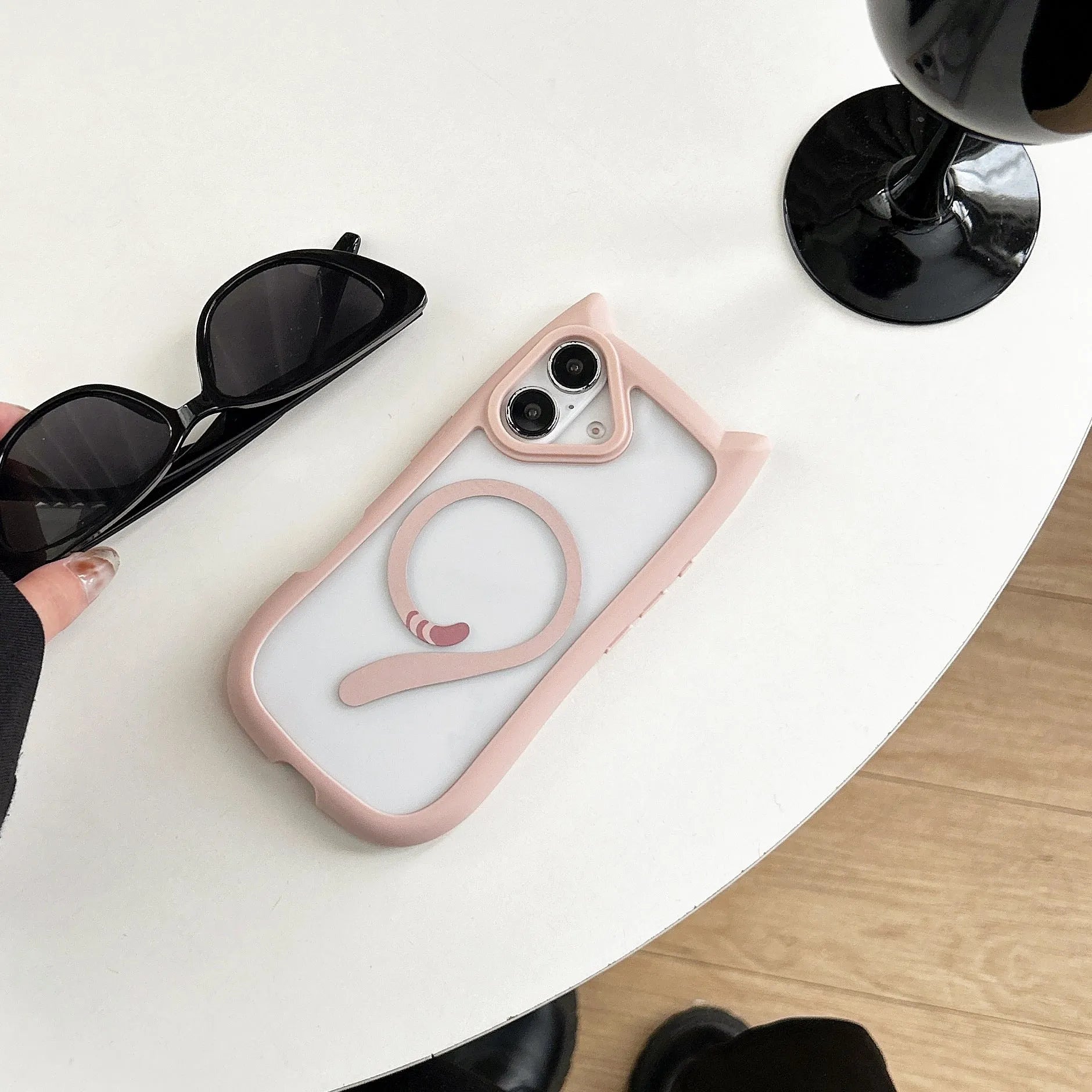 Transparent acrylic TPU iPhone 17 phone case showing magnetic suction and shockproof protection features