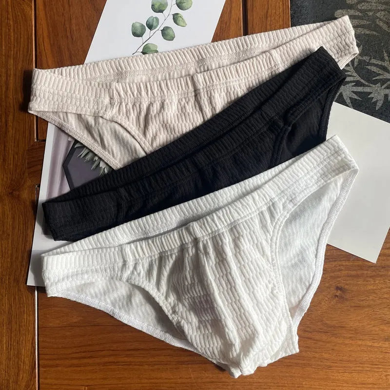 Men's pure cotton triangle underwear in solid colours with mid waist design and body shaping properties