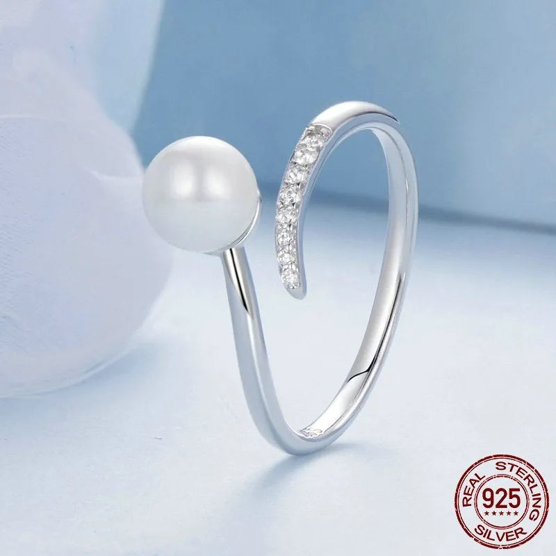 Adjustable S925 sterling silver ring with shell pearls design and open loop for flexible fit