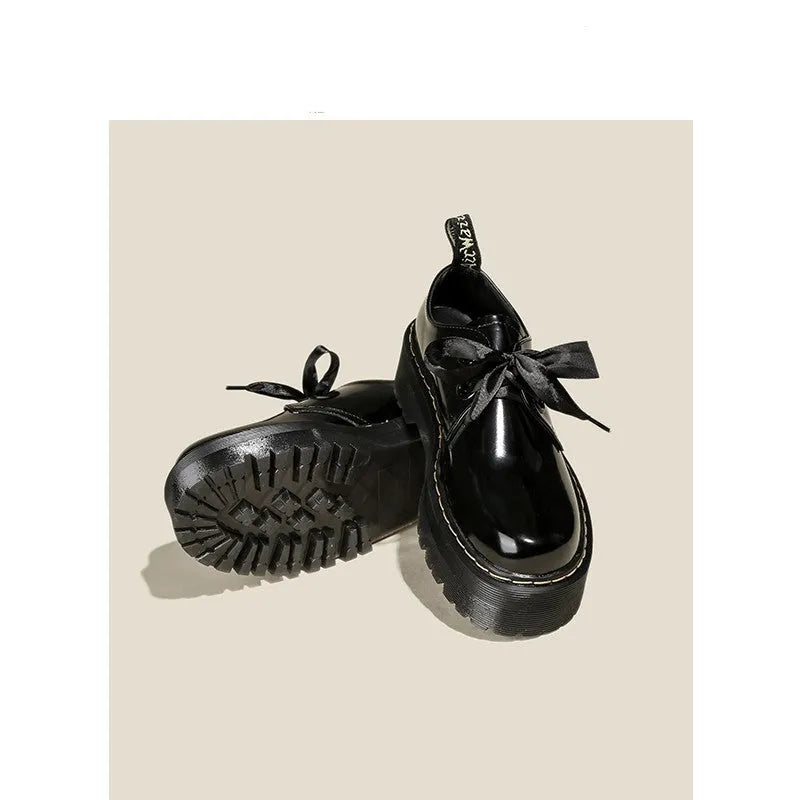 Women's thick-soled leather shoes in black with ribbon and cross strap details on superfine fibre upper