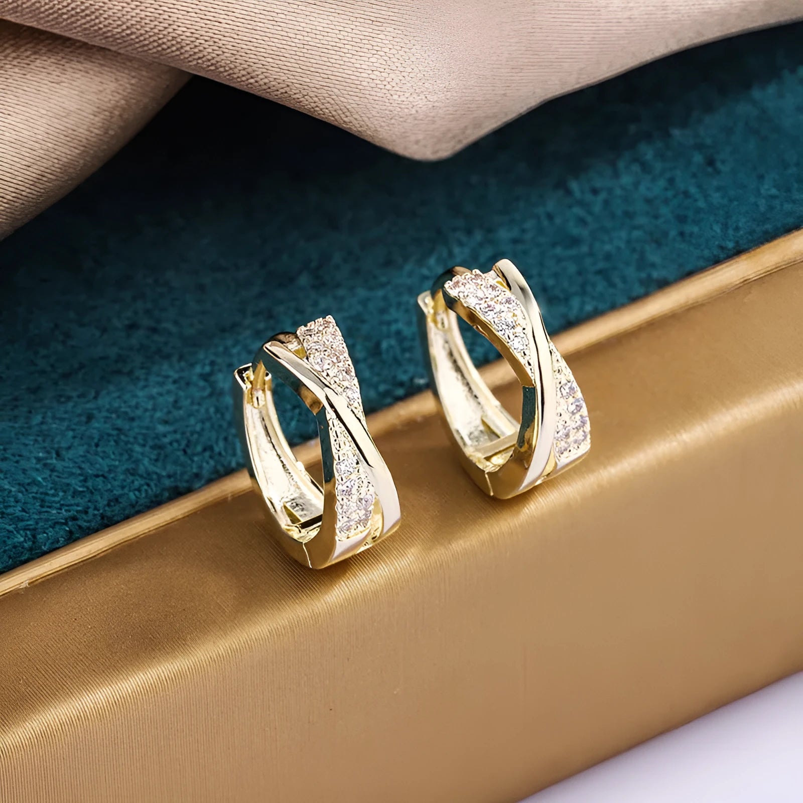 Geometric copper stud earrings with zircon detailing in 14K yellow gold colour