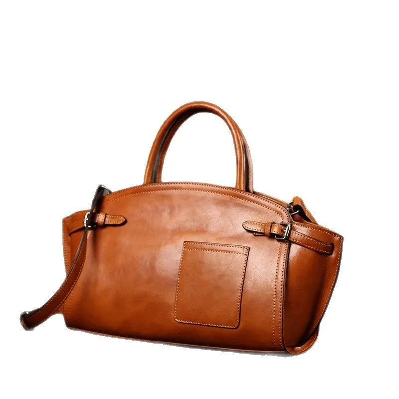 Genuine leather women's casual zip crossbody bag in brown with patchwork detail and multiple pockets