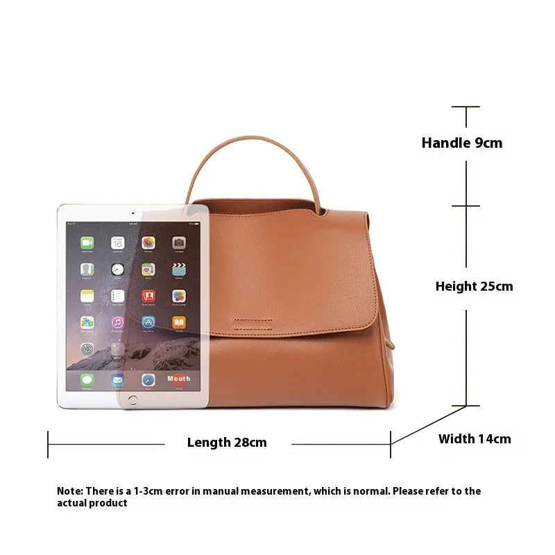 Soft genuine leather women's shoulder messenger bag in black, horizontal square shape with sewing thread detail