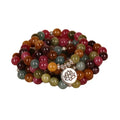 108 bead multi-layer bracelet with lotus charm in tourmaline colour on wrist