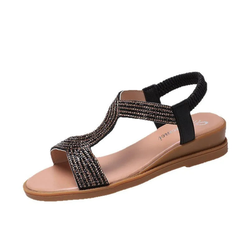Women's patent leather beach sandals with rhinestone decoration on round toe in gold colour