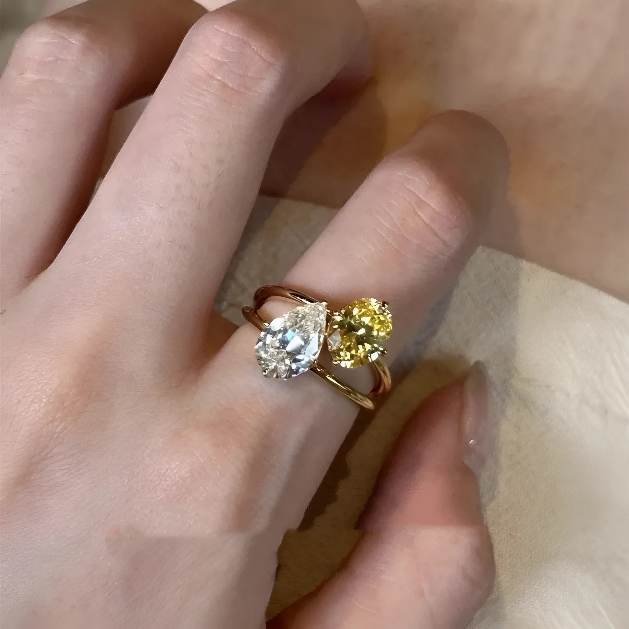 Geometric open ring with water drop double sheng stone on copper base with zircon detailing