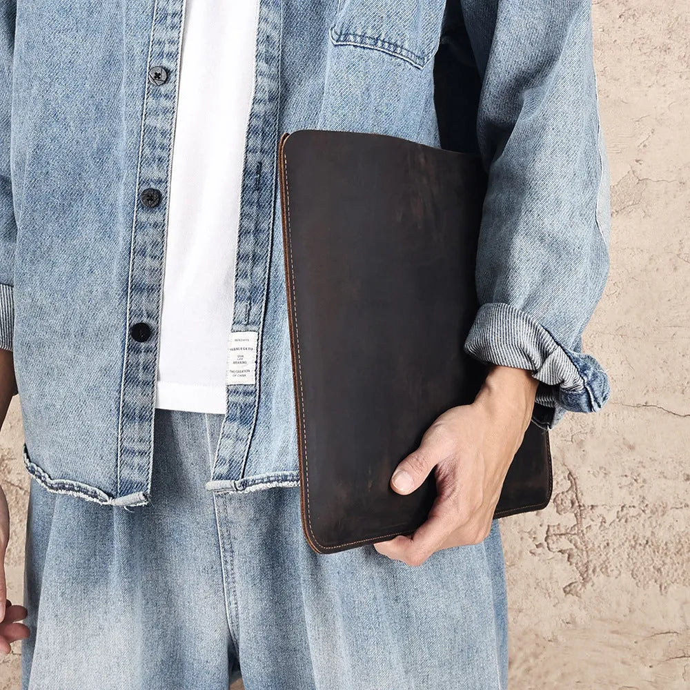 Brown genuine leather computer bag with horizontal liner design for organised storage