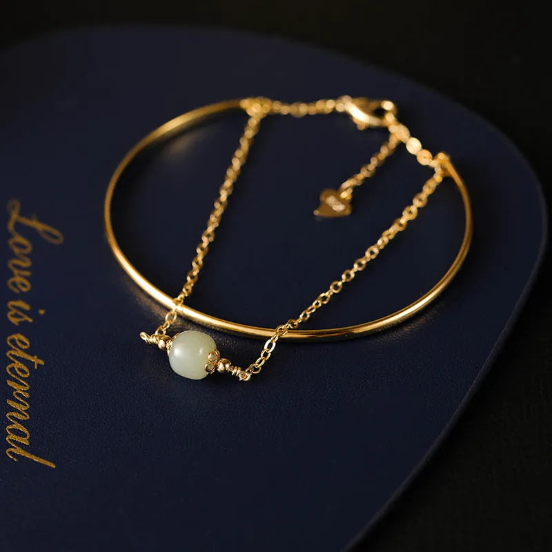 Hetian jade women's bracelet with gold inlay, showing lucky bead design in single, double, and three bead styles.