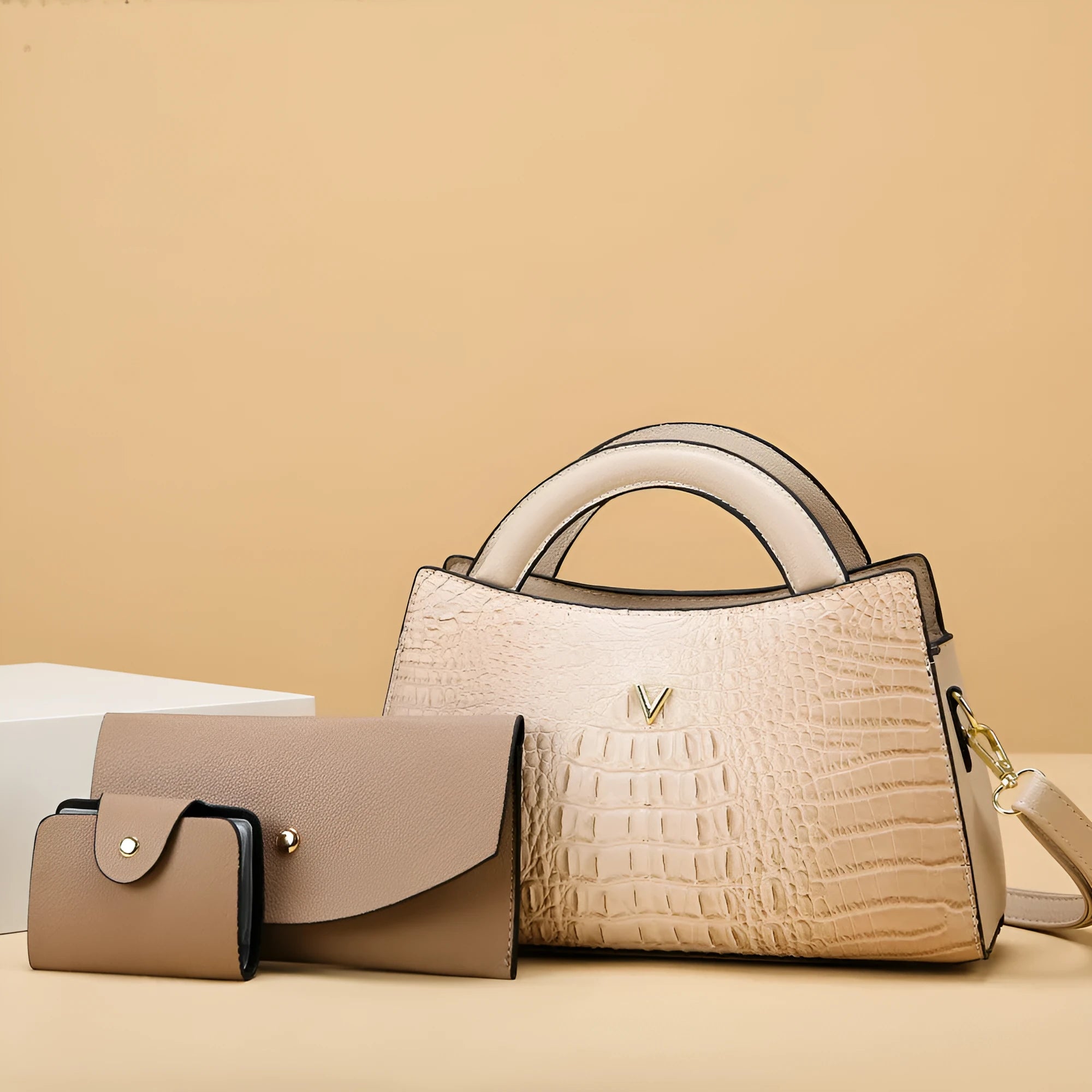 Women's square black crocodile pattern PU crossbody bag with shoulder strap and external pocket.