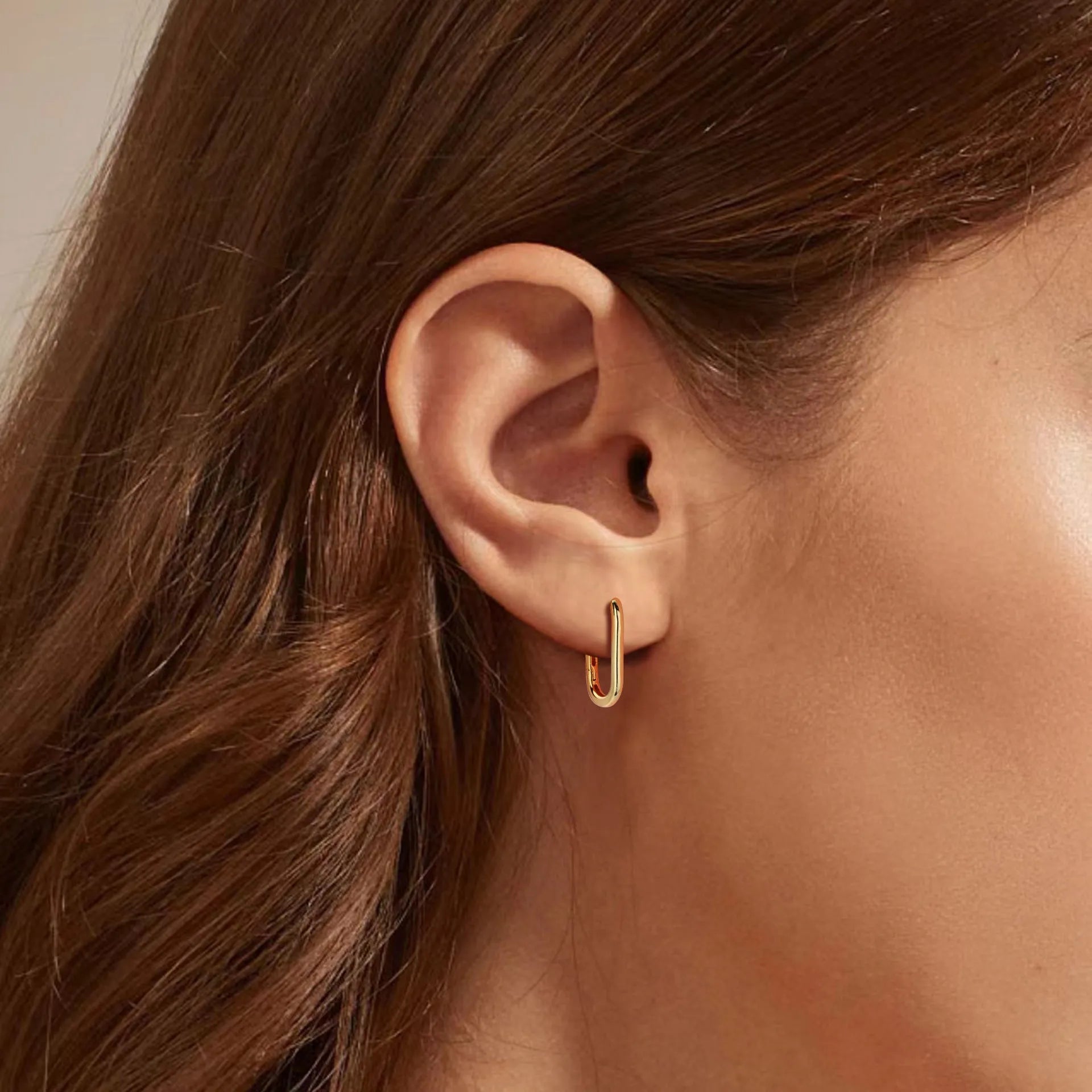 925 silver geometric earrings with gold plating oval quadrilateral shape on white background