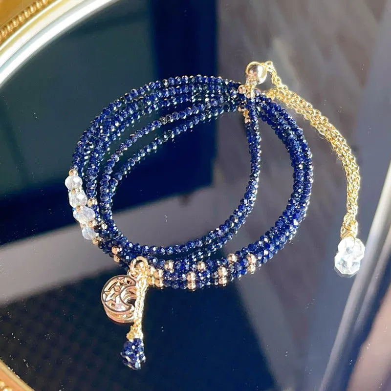 Blue gold sand stone cut women's bracelet with three interlocking rings in multi-layer design