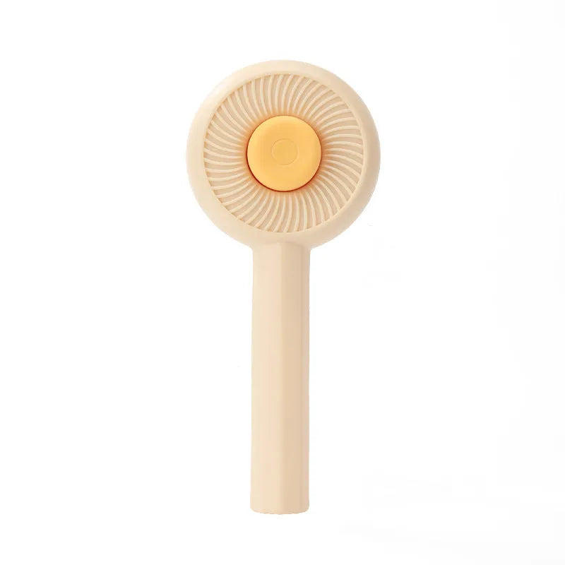 Blue and yellow pet grooming brush with metal pins and a self-cleaning button for cats and dogs.