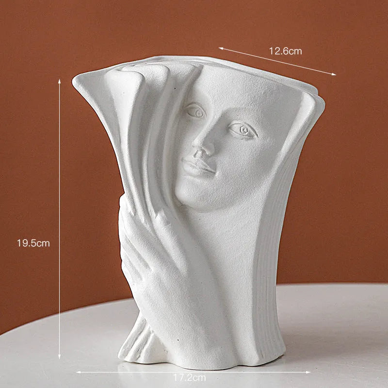 Glazed ceramic book stand in a modern style, shown in one of four colour options for desktop decoration.