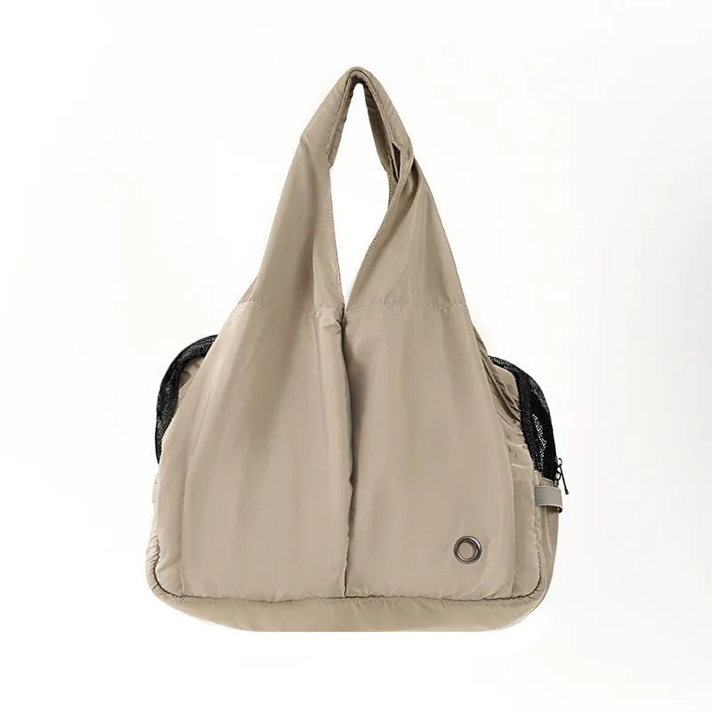 Apricot cloth pet carrier handbag for small dogs and cats showing medium size dimensions