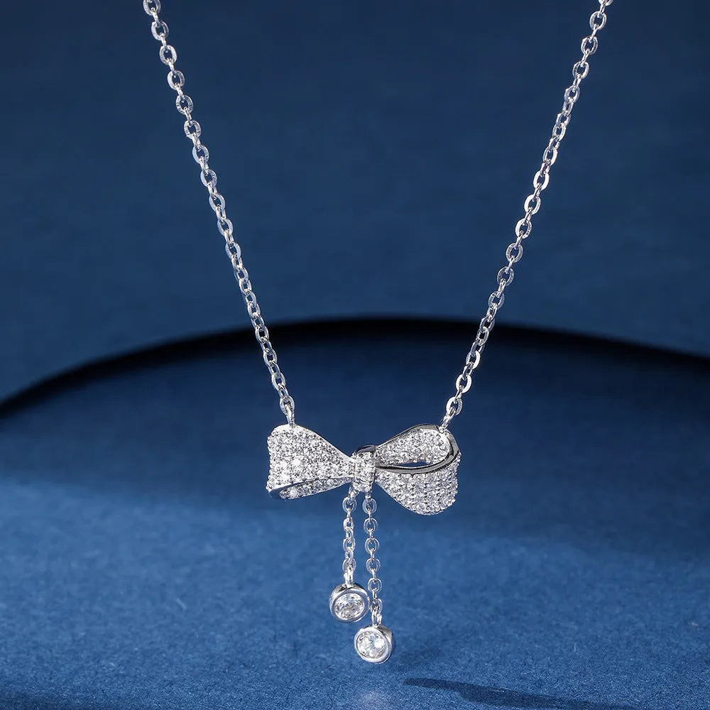 Women's S925 sterling silver bow pendant necklace on O-ring chain