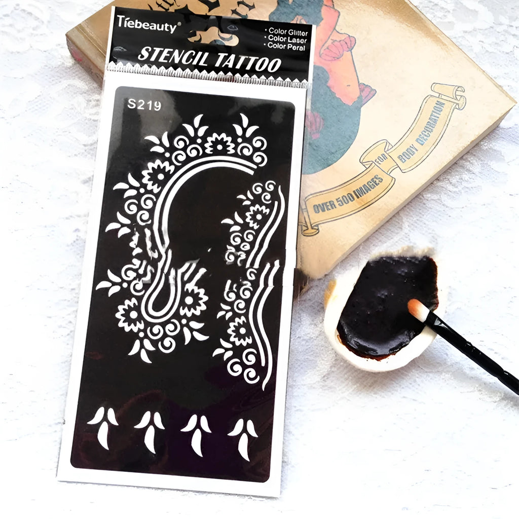 Sheet of hollow geometric pattern temporary tattoo stickers in various colours on water transfer paper.