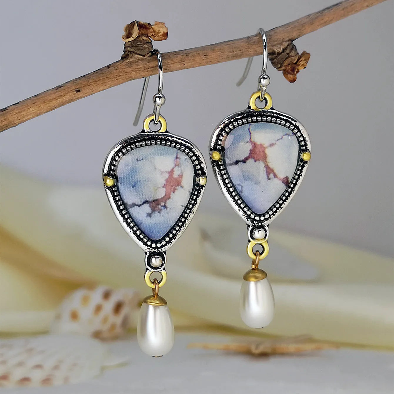 Retro blue geometric drop earrings with synthetic opal and pearl accents on metal