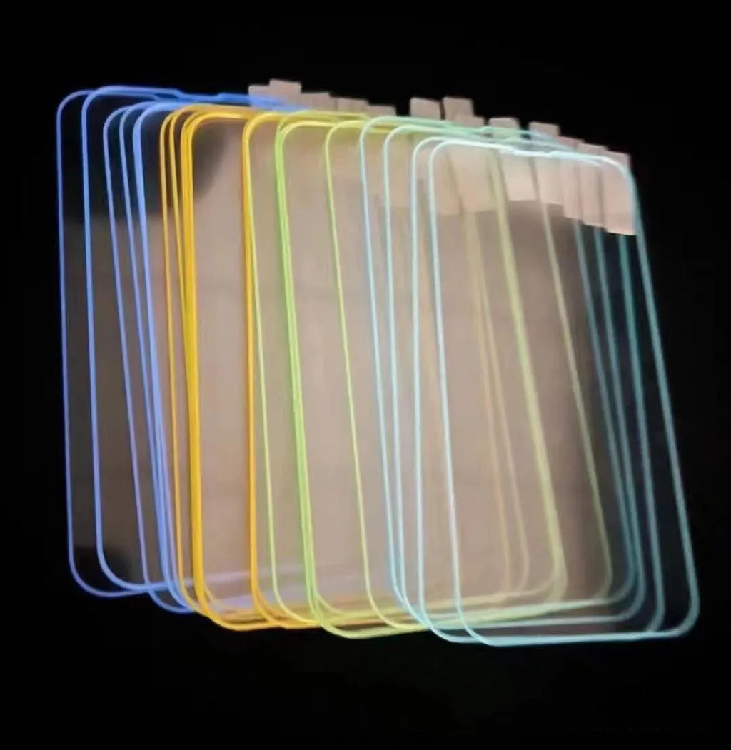 Fluorescent glowing tempered glass screen protector for iPhone on a dark background.