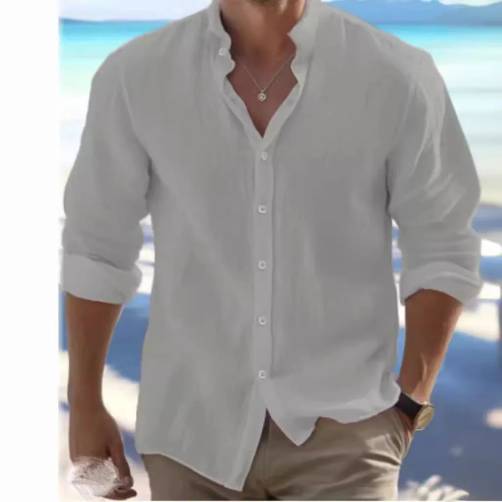 Men's casual button-up beach shirt in long-staple cotton shown in light blue colour.