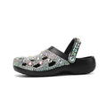 Black women's platform sandals with sparkling rhinestone detail on EVA upper and sole