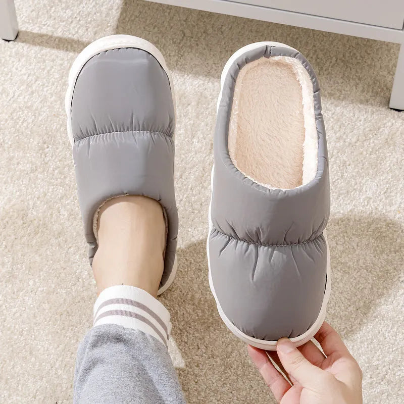Blue winter house slippers with artificial leather upper, plush lining, and thick rubber anti-slip sole.