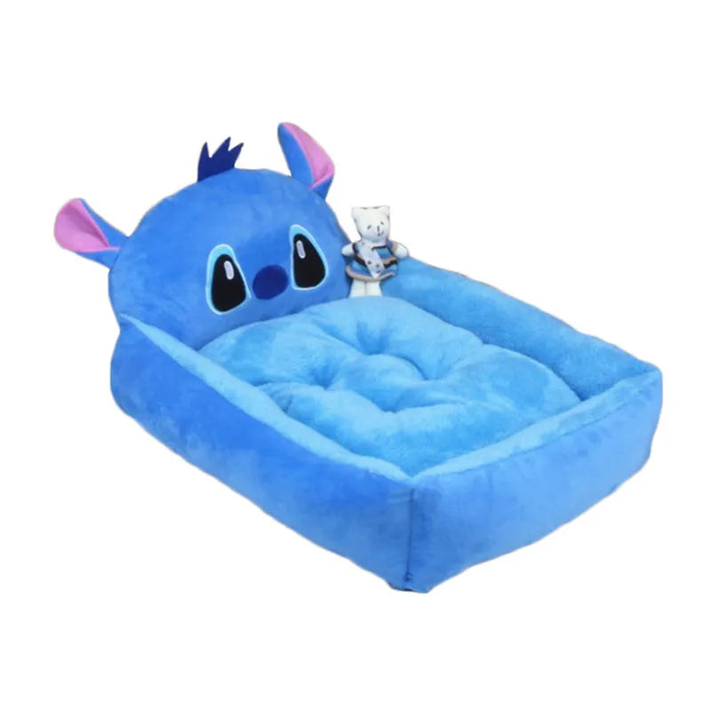 Cartoon-style plush pet sofa bed with a raised rim for a small dog or cat, shown in a blue colour