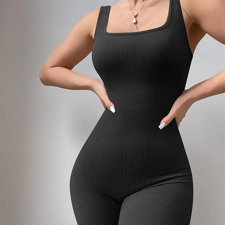 Women's long sleeve suspender tights bodysuit in beige, showing button detail and waist-defining fit.