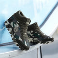 Women's green camouflage canvas sneakers with rubber sole in slip-on style