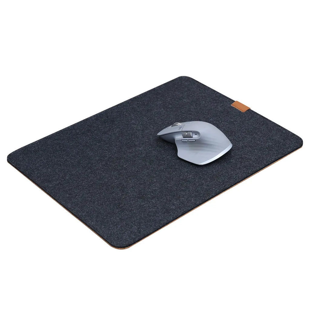 Oversized grey felt and cork desk mat with Japanese style simple design on a wooden desk