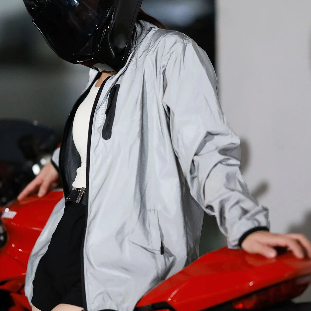 Silver long-sleeved waterproof polyester windproof jacket on a hanger.