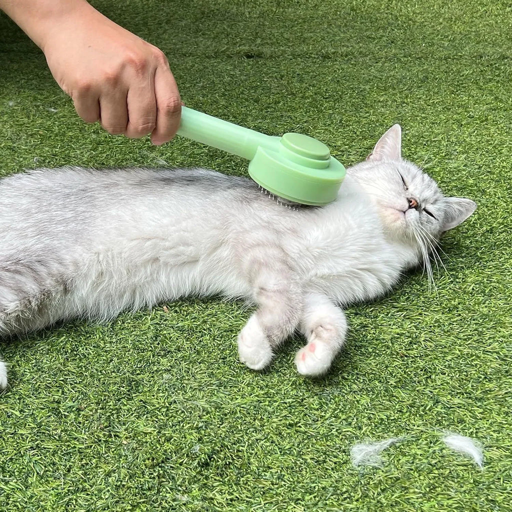 Green and yellow 2-in-1 pet grooming brush with stainless steel bristles for cats and dogs