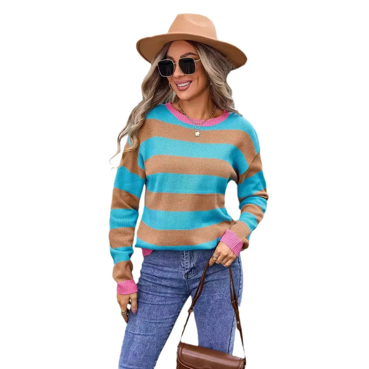 Blue striped women's loose-fit long sleeve acrylic sweater on a hanger.