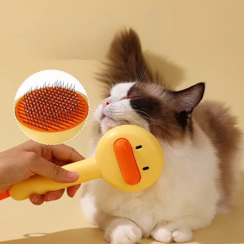 Small yellow duck comb for pet grooming with needle brush construction