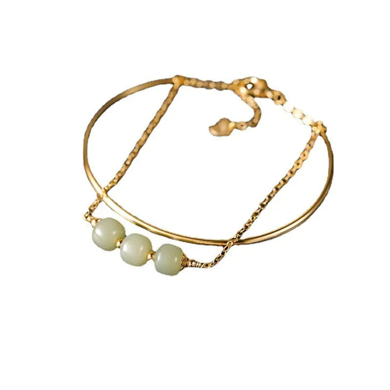 Hetian jade women's bracelet with gold inlay, showing lucky bead design in single, double, and three bead styles.