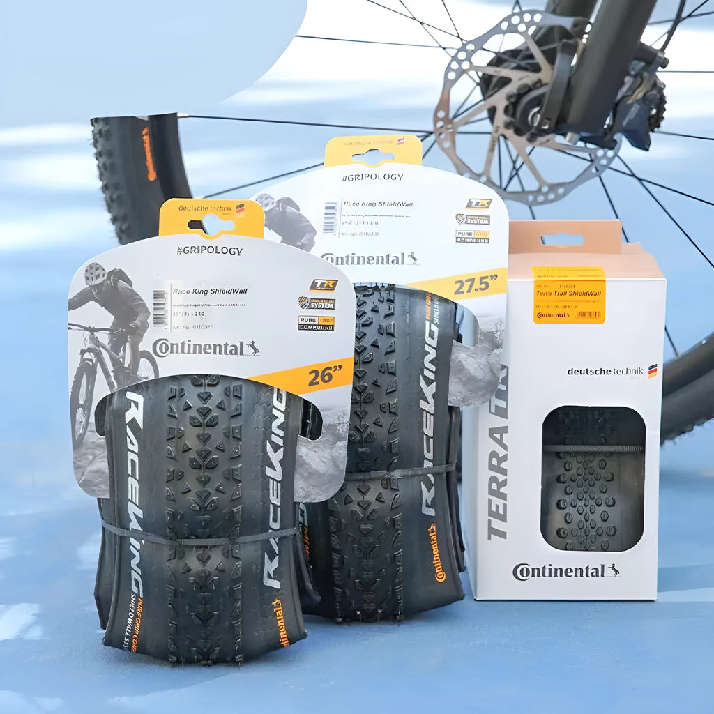 Mountain bike folding outer tyre shown in yellow sidewall, sizes include 26, 27.5 and 29 inch.