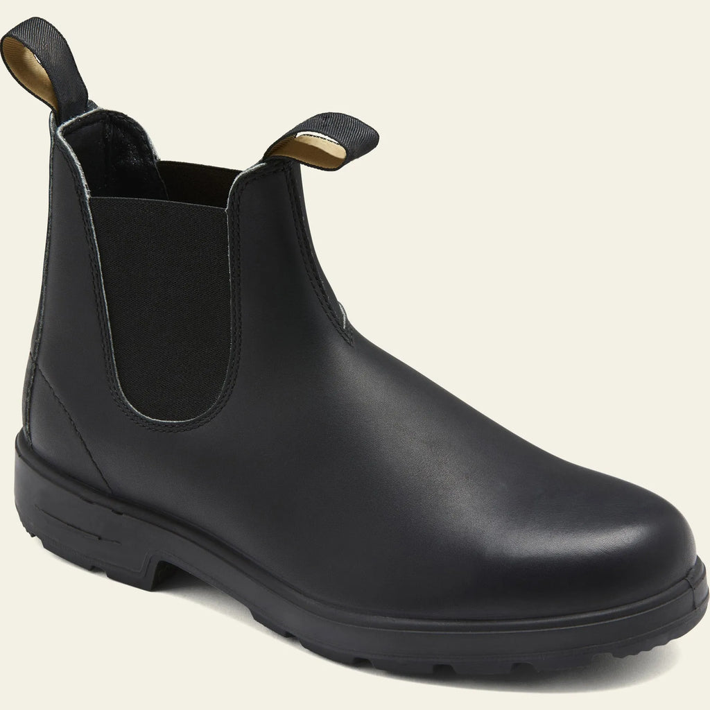 Vintage brown Chelsea boots with frosted PU upper and beef tendon sole on a neutral background