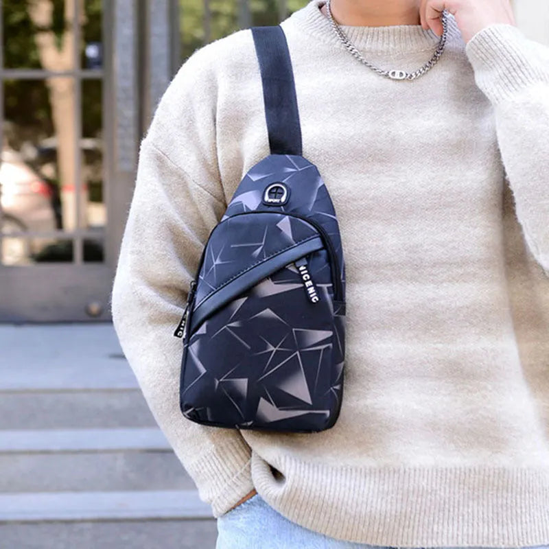 Blue print sling chest bag for men with crossbody strap and visible earphone hole