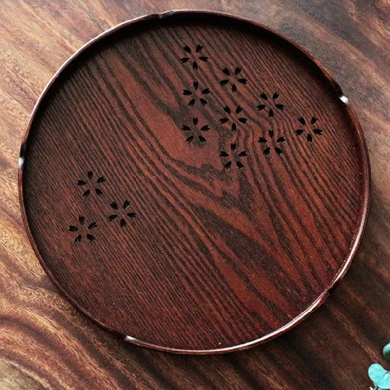 Wooden shallow plate with hollow cherry blossom pattern, 30cm long, for serving desserts indoors.