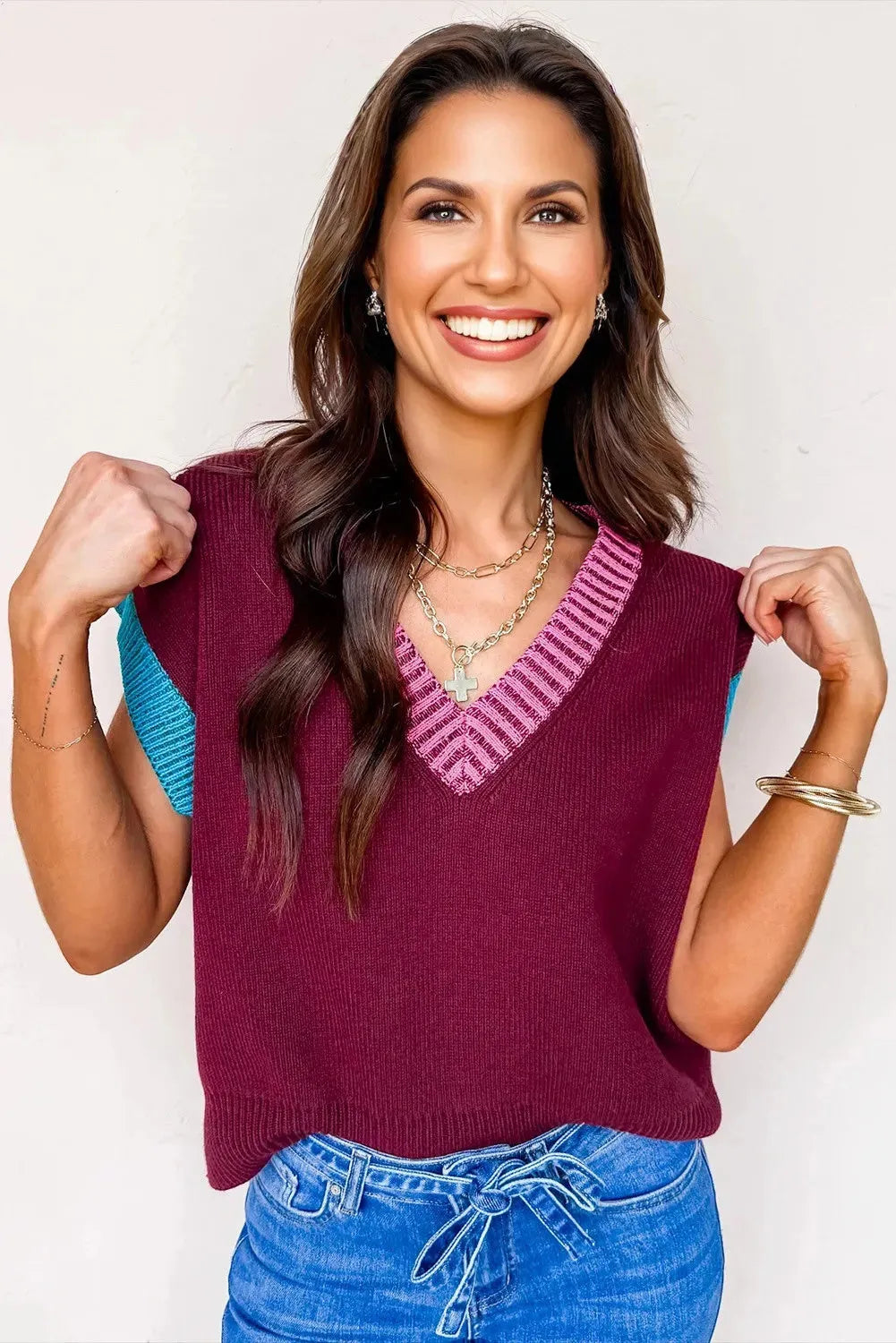 Burgundy V-neck loose sweater with contrast trim and cuffed short sleeves