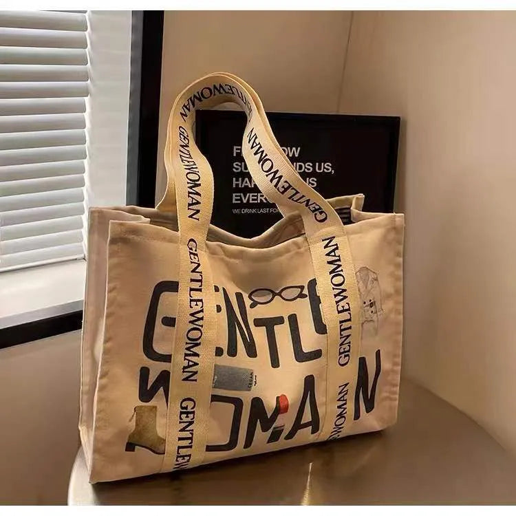 Large canvas women's tote bag with printing, shown in different colour and pattern style options.