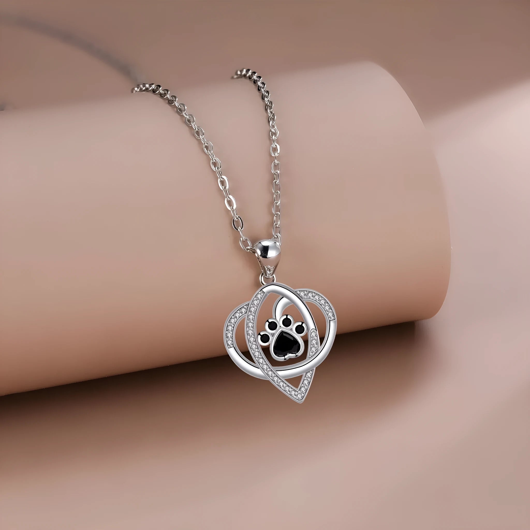Women's necklace with dog paw footprints pendant on cross chain