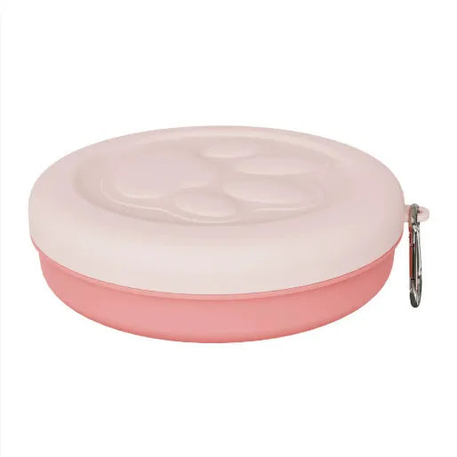 Collapsible silicone dog bowl in light green showing flat and opened positions