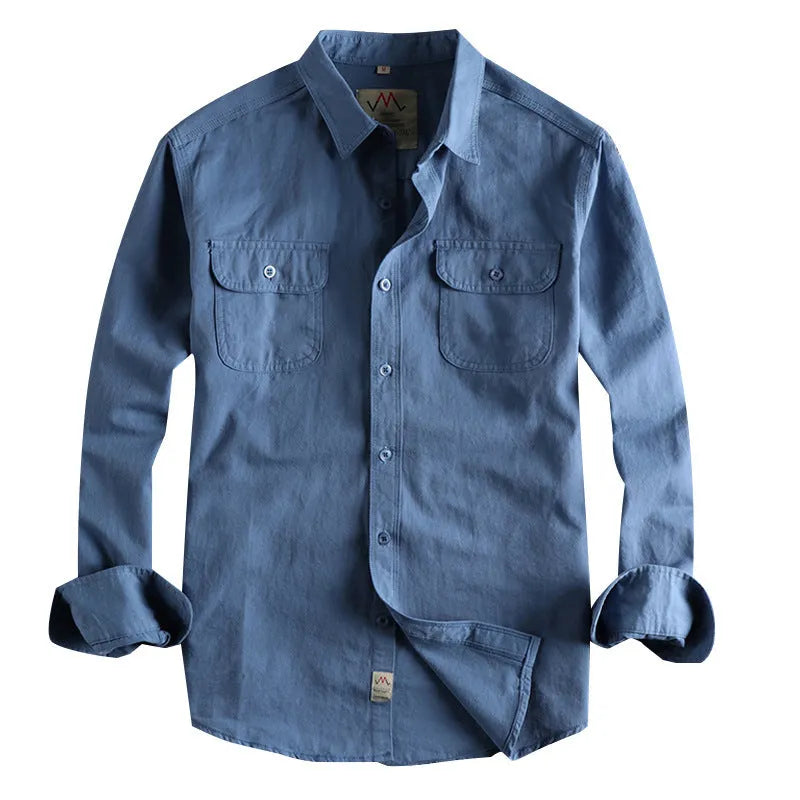 Men's light blue British retro style cotton cardigan shirt with long sleeves on a hanger.