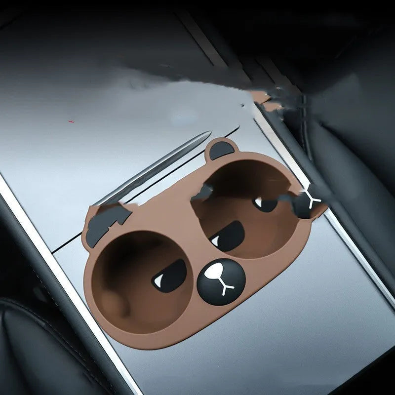 Silicone car cup holder insert in grey colour with cartoon design for reducing drink movement