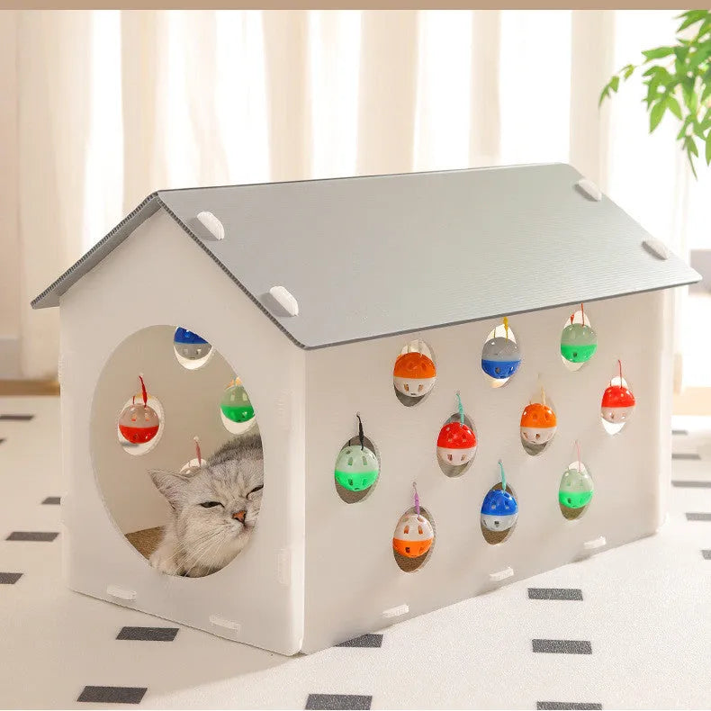 Plastic integrated cat scratch board with attached nest, tunnel, and bell ball toy