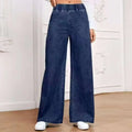 Light blue washed wide-leg straight jeans on a hanger, showing zip fly and mid-waist design.